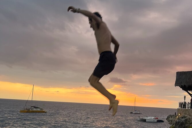 7 Mile Beach Party Catamaran Cruise with Snorkeling & Ricks Cafe - The long road from Montego Bay to Negril