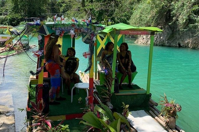 Bamboo Rafting and Horseback Riding on Beach in Ocho Rios - A slower turn on a 30-foot bamboo raft