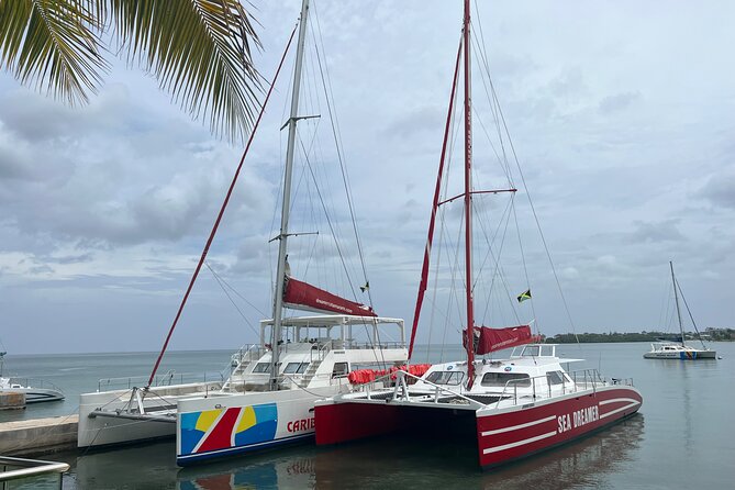 Bamboo Rafting, Catamaran Party Boat & Snorkeling In Montego Bay - From rainforest quiet to Montego Bay music