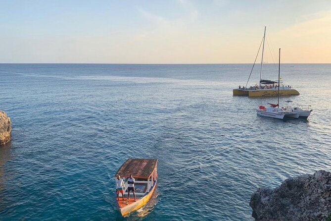 Bamboo Rafting, Catamaran Party Cruise and Ricks Cafe - Rick’s Café for cliff jumps and sea views