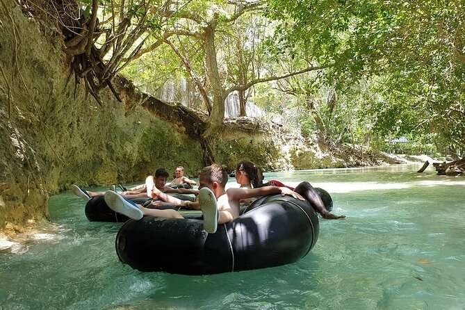 Bamboo Rafting & River Tubing Tour Ocho Rios(Entry Fee Included) - Switching to an oversized tube