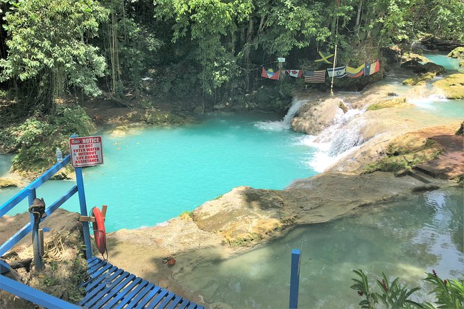 Blue Hole and Secret Falls plus Luminous Lagoon Tour - Blue Hole: cool water, rope swings, and jumps