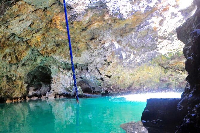 Blue Hole Mineral Spring and Rick's Cafe - More than one way to spend your two hours
