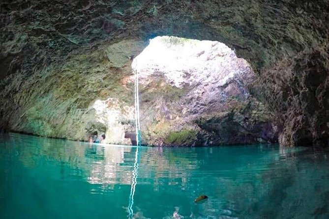 Blue Hole Mineral Spring, Ricks Cafe, 7 Mile Beach and Shopping Private Tour - Seven Mile Beach: Two Hours to Slow Down