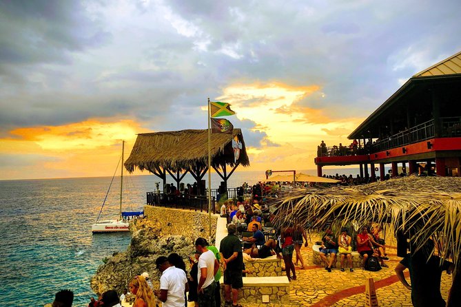Blue Hole Mineral Spring, Ricks Cafe, 7 Mile Beach and Shopping Private Tour - Ricks Cafe and the Negril Sunset