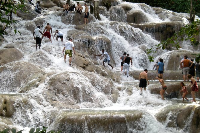 Blue Hole plus Secret Falls and Dunns River Falls Combo from Runaway Bay Hotels - Dunn’s River Falls: climbing from beach to forest