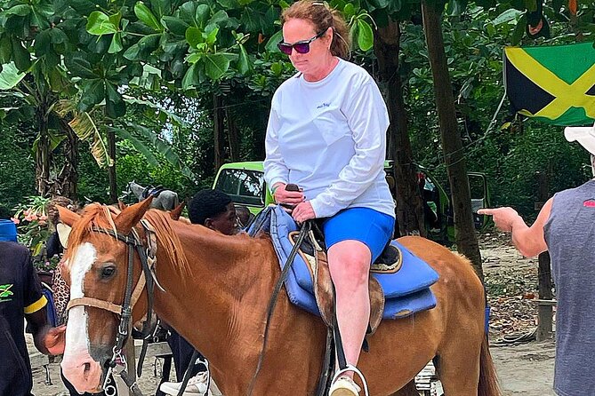 Blue Hole, River Tubing, and Horse Ride with Swim Ocho Rios - A slower bamboo raft ride toward the coast