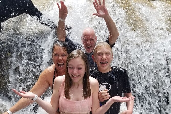 Blue Hole, Secret Falls & River Rapids Tubing from Montego Bay - White River tubing, from calm water to faster current