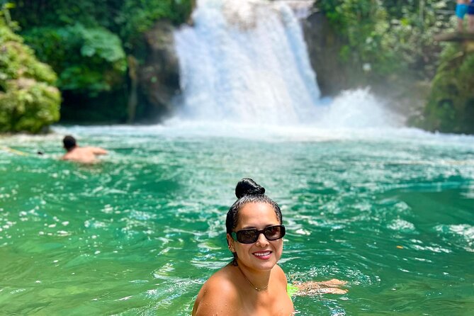 Blue Hole Waterfalls and Bamboo Rafting with Transportation - What the Great White River adds
