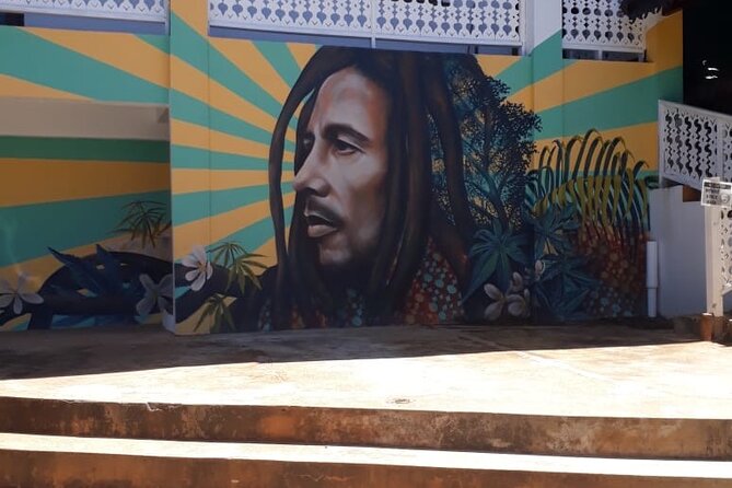 Bob Marley Nine Mile and Dunns River Combo from Ocho Rios - A Jamaican food stop between the attractions
