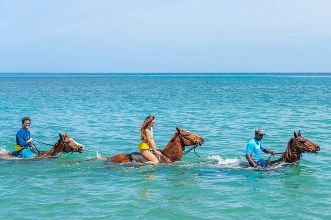 Catamaran, ATV and Horse Back Riding/Swim - Music and rum punch on the party cruise