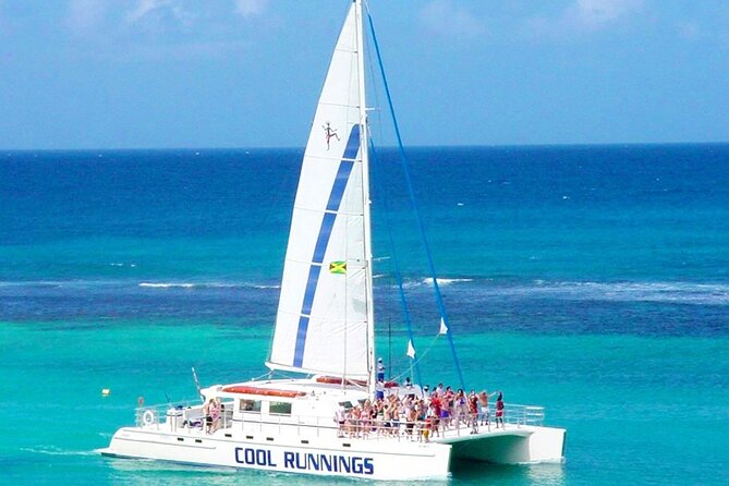 Catamaran Party Cruise and Snorkeling from Montego Bay - Margaritaville brings slides, food, and extra costs