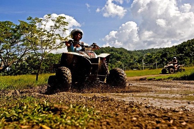 Chukka ATV Safari - Passing a Jamaican village and an old church