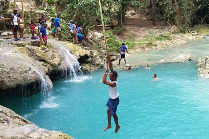 Dunn's River Falls, Blue Hole, Bamboo Rafting, Horseback Combo - Climbing Dunn’s River Falls for 600 feet