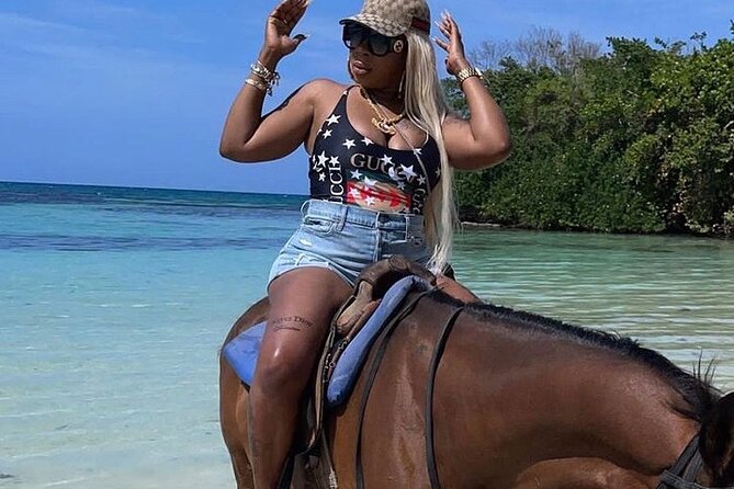 Dunn’s River Falls,Zip lining & horseback riding Combo tour from Montego Bay - Climbing Dunn’s River Falls on foot