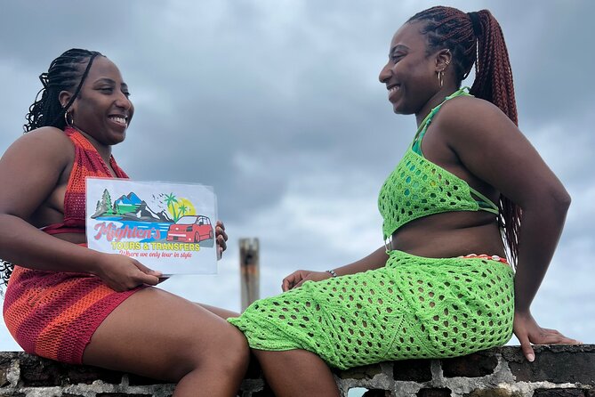 Explore Negril Day Tour beach and Ricks Cafe From Montego Bay - The Negril sign and the road into town