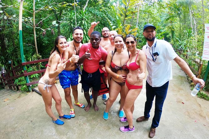 "Explore Scenic Tropical Waterfalls at Blue Hole" - The Blue Hole stop: water, rocks, and forest