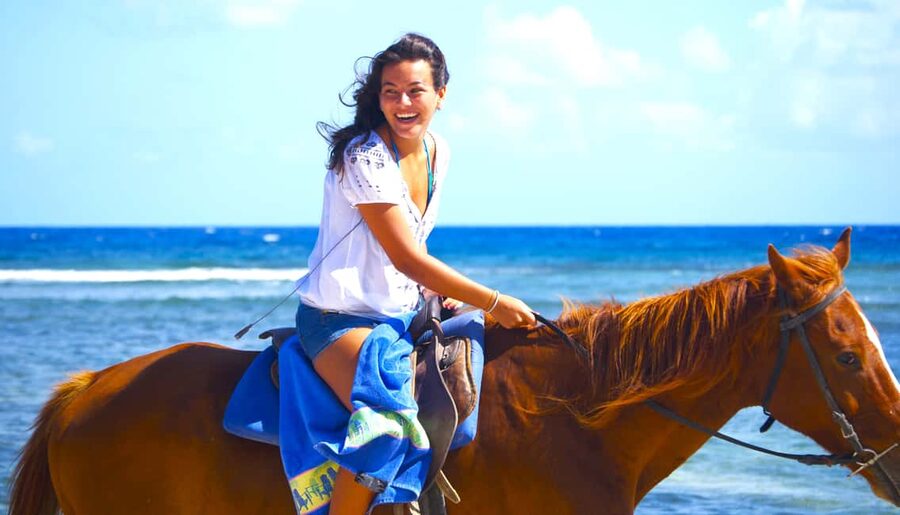 From Falmouth: Horseback Ride and Swim Beach Trip - A one-hour ride through farmland and coastal views
