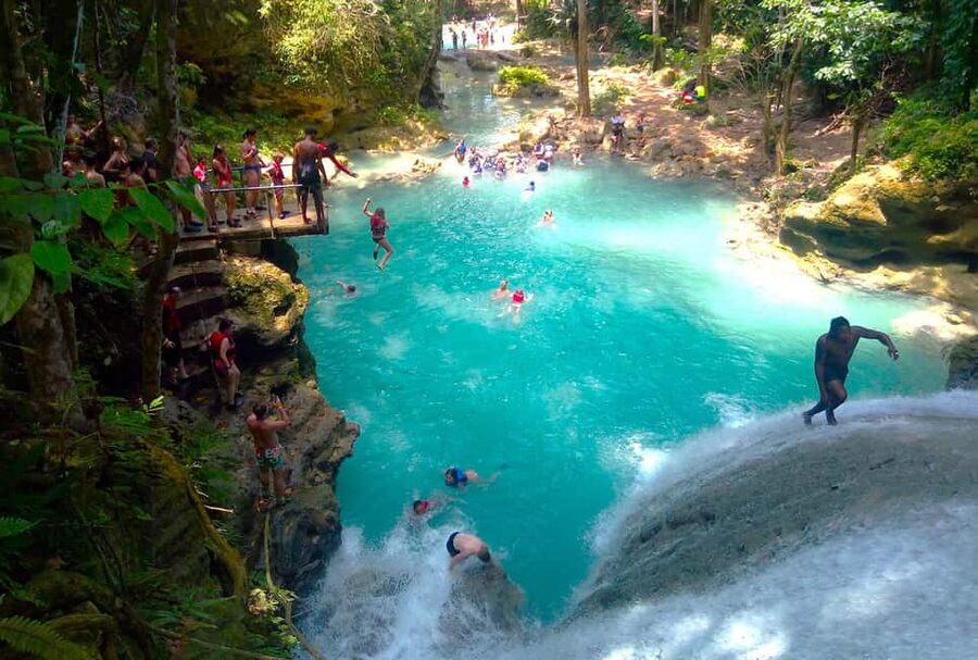 From Runaway Bay: Island Gully Falls and Blue Hole Tour - Rope swings, high jumps, and waterfall pools