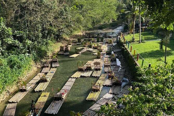Half-Day Tour Rafting on the Great River with Limestone Foot Massage - Boarding a bamboo raft at Lethe