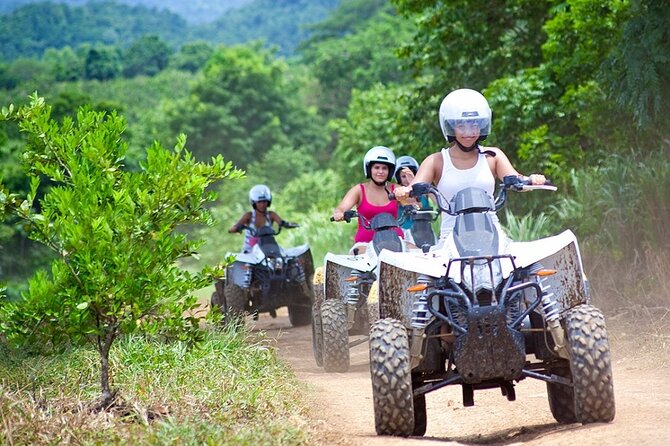 Horseback Ride ATV and Bamboo Rafting Tour Ocho Rios in Jamaica - ATV Riding Through the Hills at Rad Venture