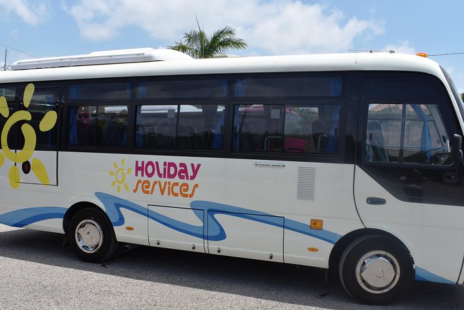 Jamaica Super Saver: Montego Bay & Rose Hall plus Mystic Lagoon Night Cruise - Montego Bay through Sam Sharpe Square and St James Parish Church