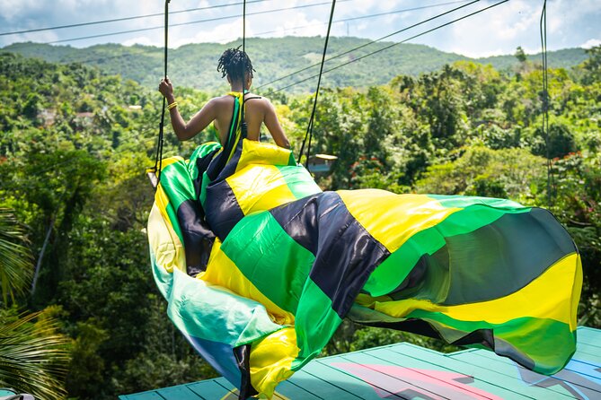 Jamaica Swing Drone Photoshoot with Dress Lunch and Transport - Riding the Rad V Swing above the trees