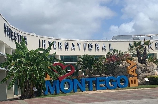 Kingston Airport Pick up/ Drop off (Norman Manley Int) - Private transport for one group