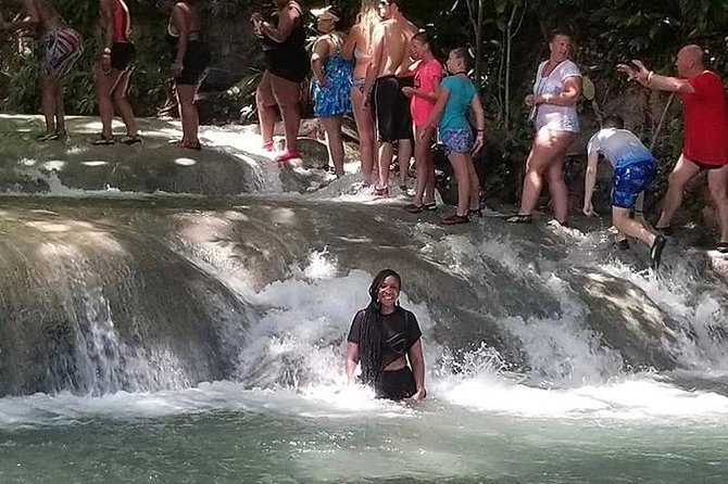 Martha Brae and Dunn’s River Falls Day Tour - Lunch, Jamaican food, and optional shopping