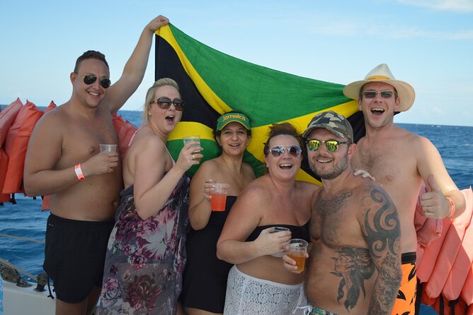 Montego Bay Catamaran: Snorkel Tour with Open Bar & Reggae DJ - The foot massage and adults-only format