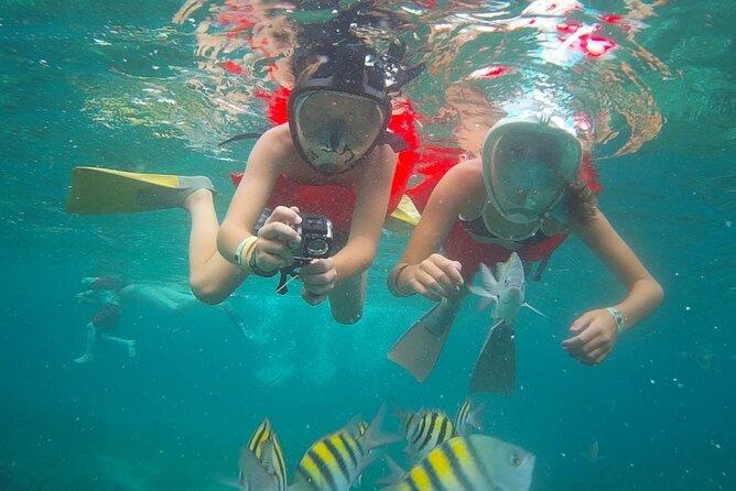 Montego Bay Catamaran: Snorkel Tour with Open Bar & Reggae DJ - Weather, cancellation, and the risk of a fixed booking