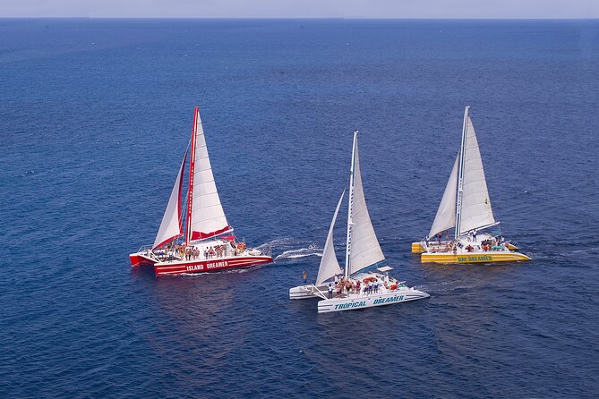 Montego Bay Catamaran: Snorkel Tour with Open Bar & Reggae DJ - Front nets, warm sun, and music at sea
