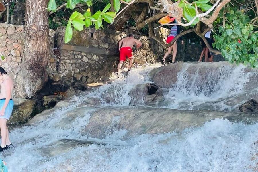 Montego Bay: Private Dunn's River Falls and Blue Hole Tour - Two Jamaican waterfalls, two very different moods