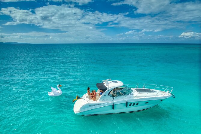 Montego Bay Private Yacht Tour with Open Bar and Lunch - Cruising past the Hip Strip and harbor