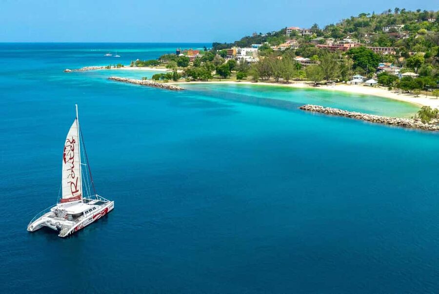 Montego Bay: Reggae Catamaran 18+ Cruise with Open Bar - Sailing along Montego Bay’s coast