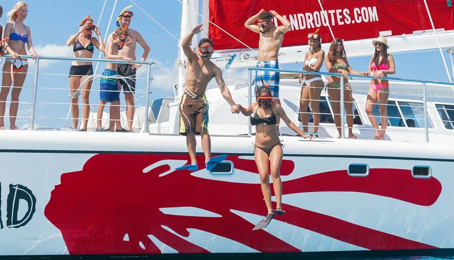 Montego Bay: Reggae Family Catamaran Cruise with Snorkeling - Reggae, snacks, and the ride back