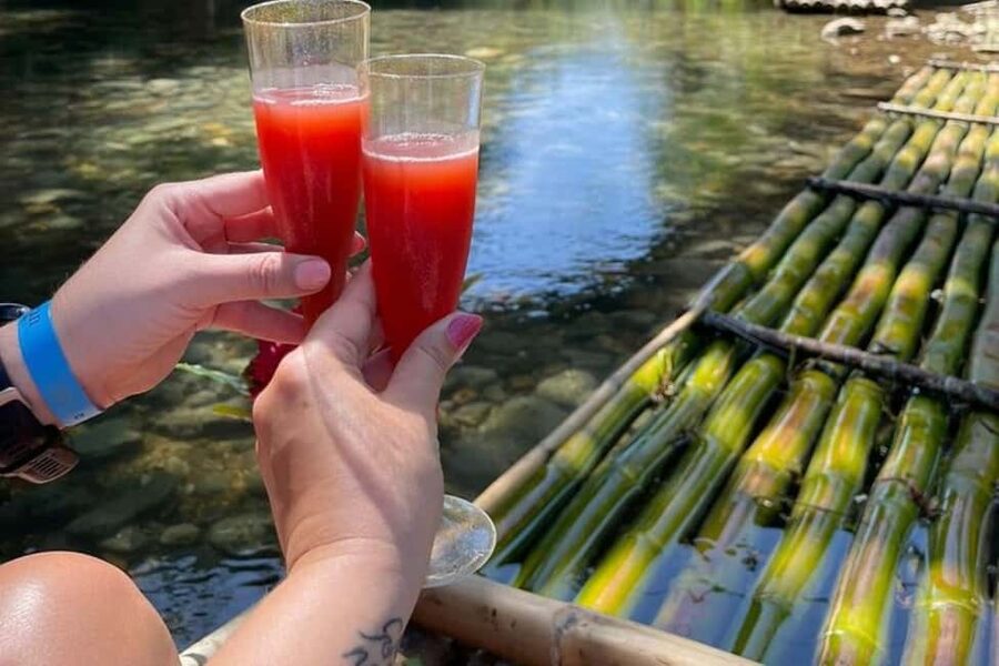Montego Bay: River Rafting and Dunn's River Falls Day Trip - Floating through the Rio Nuevo rainforest