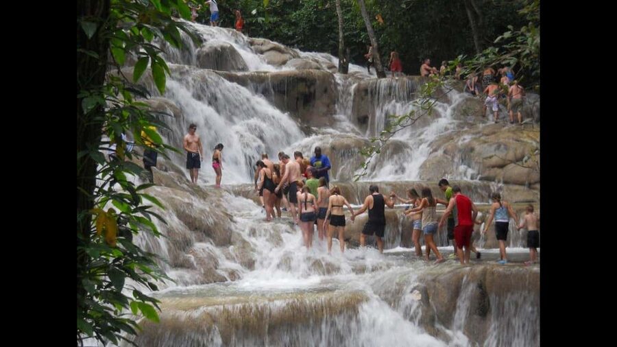 Montego Bay: River Rafting and Dunn's River Falls Day Trip - Climbing the 155-foot Dunn’s River Falls