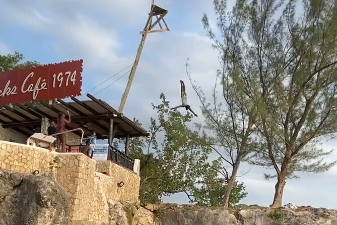 Negril 7 mile Beach, Party Catamaran Cruise , Snorkeling and Ricks Cafe Combo - From Montego Bay to Negril in a private vehicle