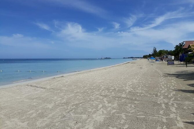 Negril 7 Miles Beach and Rick's Cafe Tour - Two Hours Along Seven Mile Beach