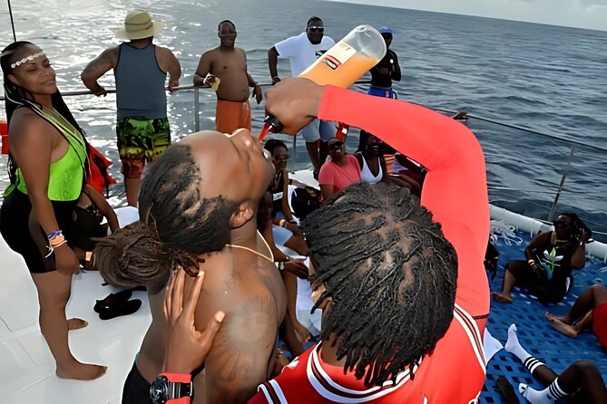 Negril Catamaran: Adults Sunset Party with Drinks & DJ - Rick’s Cafe and the sunset finale