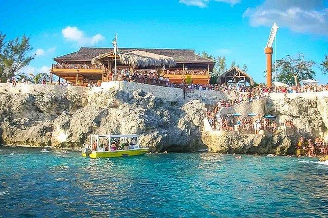 Negril Ricks cruise PLUS Booby Cay Lobster & Cave Snorkeling - An hour at Rick’s Cafe