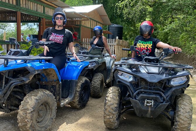 No driver’s license required Atv ride with transportation. - Riding through forest and tropical scenery