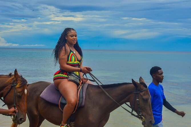 OCEAN HORSE-BACK RIDING & BAMBOO RAFTING + Limestone MASSAGE - One hour on horseback beside the sea