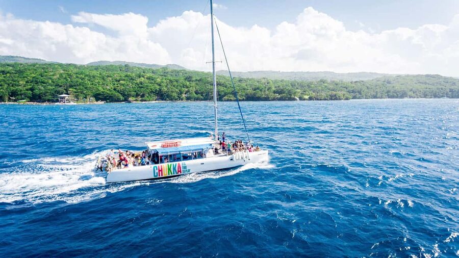 Ocho Rios: Catamaran Sail & Snorkel + Dunn's River Climb - Sailing from Ocho Rios with reggae on the water