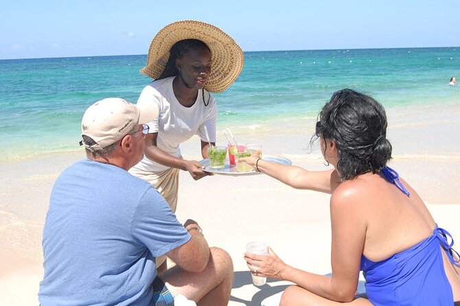 Ocho Rios: River Tubing, Lunch and Cocktails at Bamboo Beach Club - Bamboo Beach Club: lunch, chairs, and Caribbean water