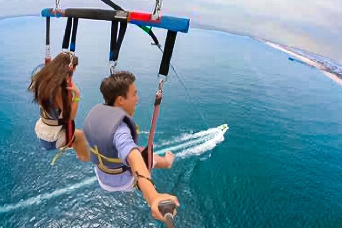 Parasailing above Turquoise Ocean Waters in Montego Bay - Flying Above Montego Bay’s Blue-Green Water