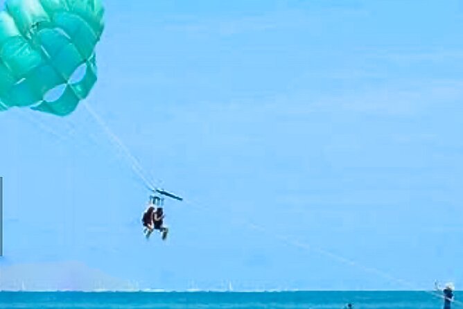 Parasailing above Turquoise Ocean Waters in Montego Bay - What Happens When You Arrive at the Water