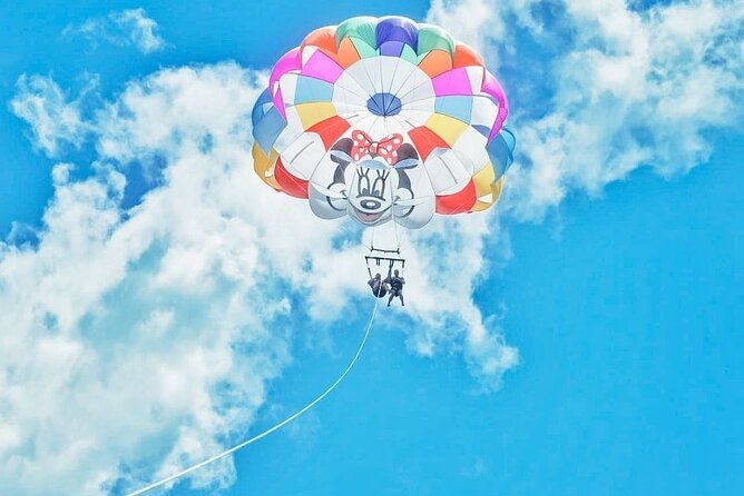 Parasailing, Blue Hole Mineral Spring, Seven Mile Beach - Blue Hole Mineral Spring, from tree jump to calm swim