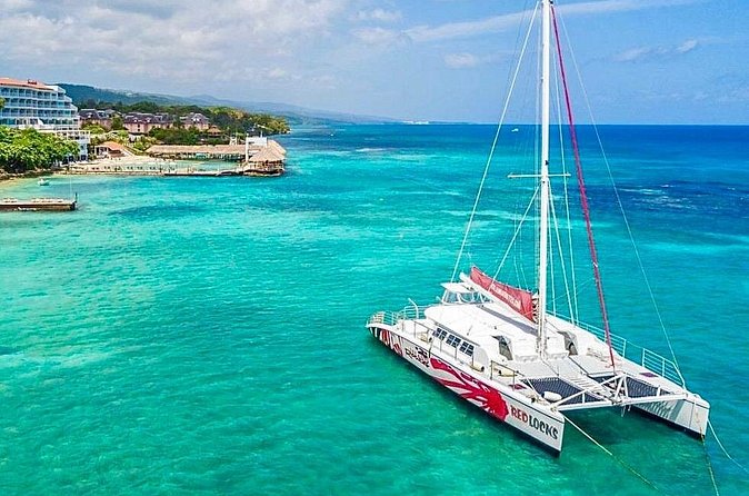 Party Catamaran Cruise with Open Bar and Snorkeling Montego Bay - Open bar, snacks, and the real value of $180
